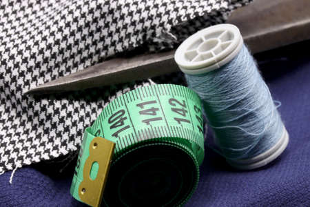 sewing accessories on fabric backgroundの写真素材