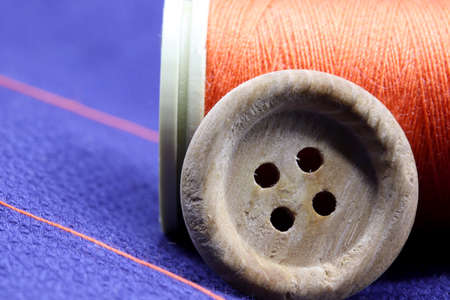 colorful buttons on fabric backgroundの写真素材