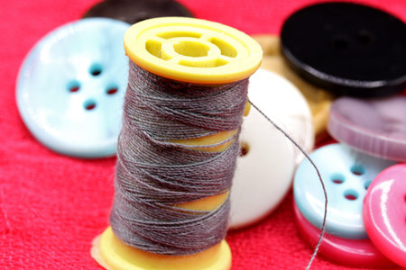 sewing accessories on fabric background