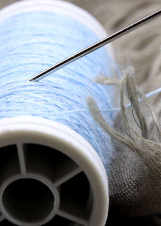 sewing accessories on fabric backgroundの写真素材