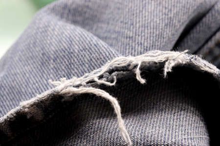 close-up blue jean fabric texture detail backgroundの写真素材