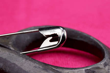 tailoring supplies and sewing accessories on fabric backgroundの写真素材