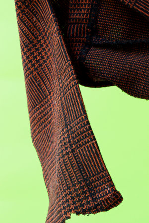 pieces of colorful fabric on a green background