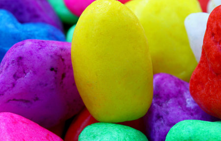 close-up colorful painted pebbles background