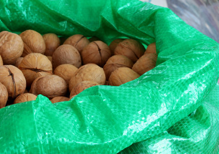 a lot of walnuts in a sack