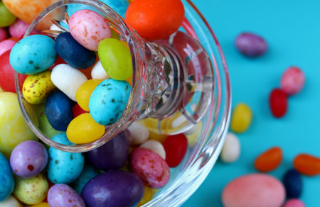 close-up colorful candies in glass bowl