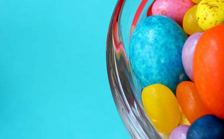 close-up colorful candies in glass bowlの写真素材