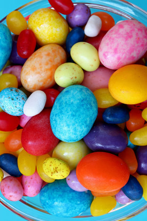 close-up colorful candies in glass bowl