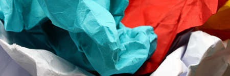crumpled colorful paper texture backgroundの写真素材
