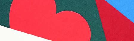 red paper heart on colorful backgroundの写真素材