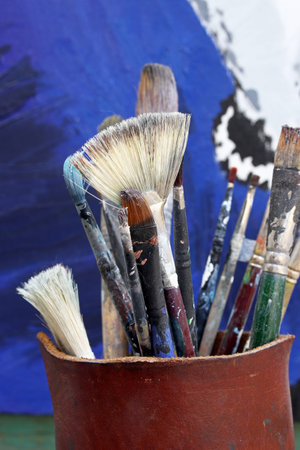 close-up old dirty brushes for painting
