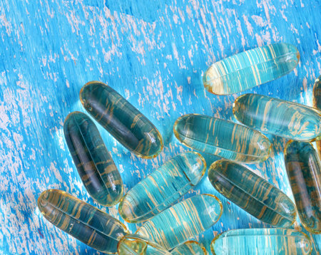transparent pills on blue background