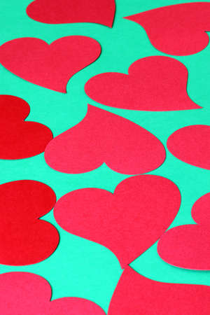 red hearts on a green backgroundの写真素材