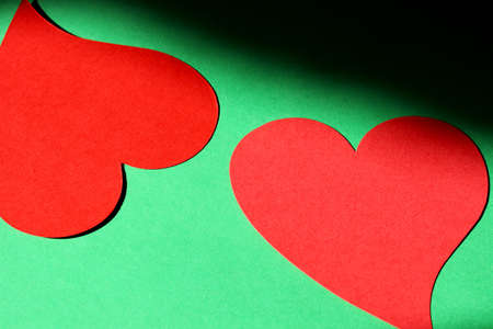 red hearts on a green backgroundの写真素材