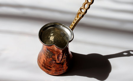Turkish coffee pot on the tableの写真素材
