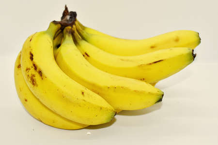 Bunch of ripe bananas on white backgroundの写真素材