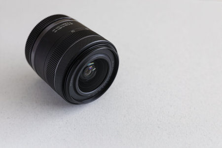 Camera lens on a white background. Close-up. View from above.