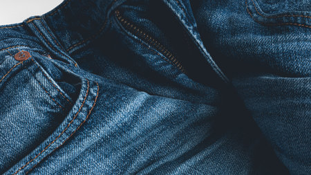 Close up of blue jeans texture background. Jeans fashion design.の写真素材
