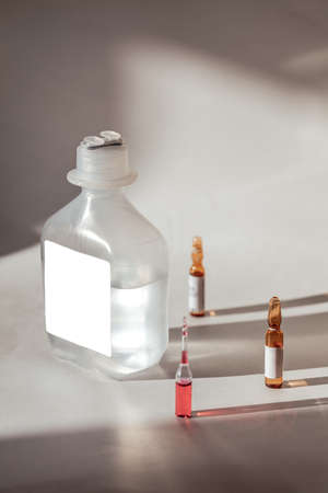 Vaccines Used for prevention, immunity and treatment from  infection or . Concepts of disease prevention. Focus on vial, blurred background. isolated white labelの写真素材