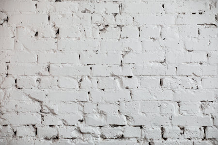 White grunge brick wall background. Loft or rural room,の写真素材
