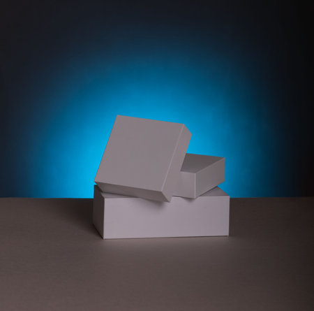 White gift boxes. Blank gift boxes and gift bags on blue background with shadow. Blank Mock up files