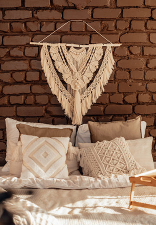 Empty Bed, Elegant Brick Wall on Background. Bedroom Modern and Cozy Interior. Soft Pillow and...