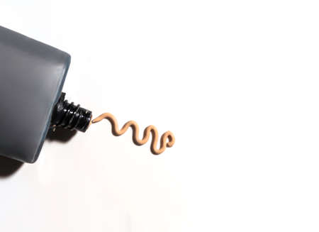 Creamy foundation white background. Isolated. Beauty and fashion conception. Liquid cream cosmetic,の写真素材