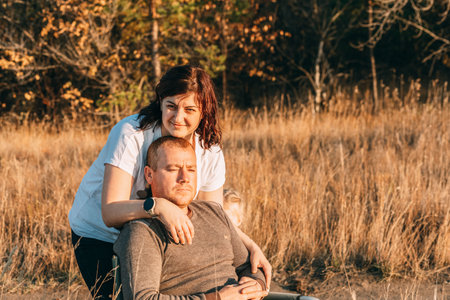 Loving Caucasian Couple In Countryside. Gentle hugs, a concept for Valentines Dayの写真素材