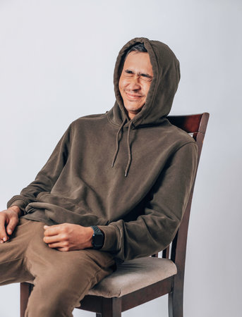 photo of Asian man with laugh face on white background