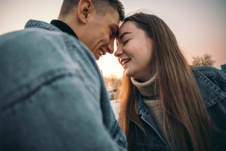 stunning sensual young couple in love posing at the sunset, happy lifestyle conceptの写真素材