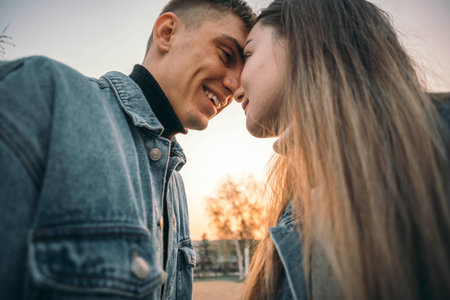 stunning sensual young couple in love posing at the sunset, happy lifestyle conceptの写真素材