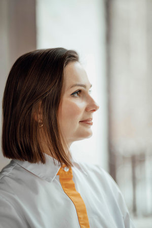 future aspirations and professional determination. confident professional looking out of the window,...