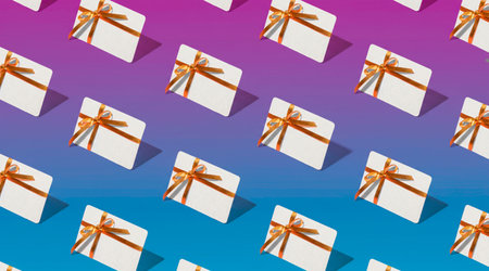 A pattern of gift cards on a gradient background of pink and blue.