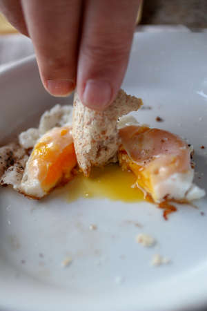 make breakfast with different egg and breadの写真素材