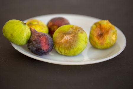fig is a rotting fruit very quickly. rotted figs in a bowl.