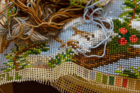 Cross-stitch handle is very colorful and tasteful