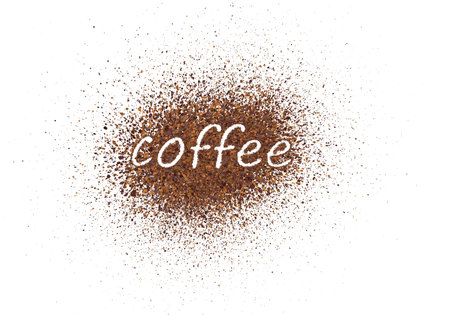 The word coffee is written with scattered powder. Text made from coffee or chocolate powder flying dust particles on white background. Crushed granules of sand or brown cane sugar, vector illustrationのイラスト素材