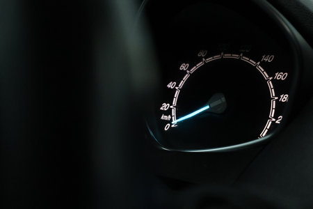 Close up shot of a speedometer in a car. At an engine speed of 1800 rpm on Car dashboard.の写真素材