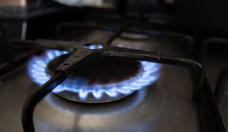 Gas burner close up on a kitchen gas stoveの写真素材