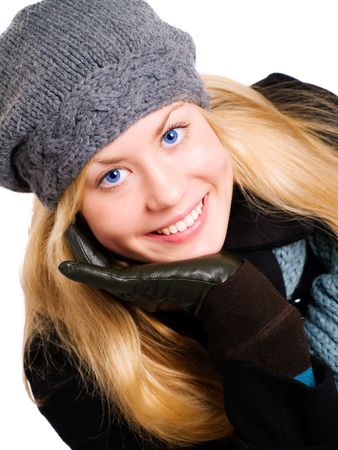 closeup of smiling blond woman in winter clothesの写真素材