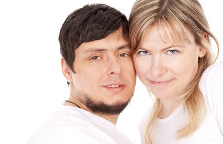 Happy smiling couple in love over white backgroundの写真素材