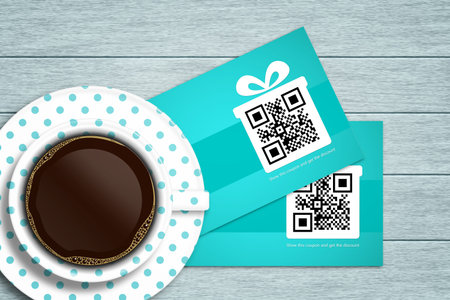 christmas coupons lying on wooden desk with coffee