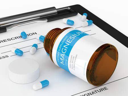 3d render of magnesium pills in bottle with prescription  isolated over white backgroundの写真素材