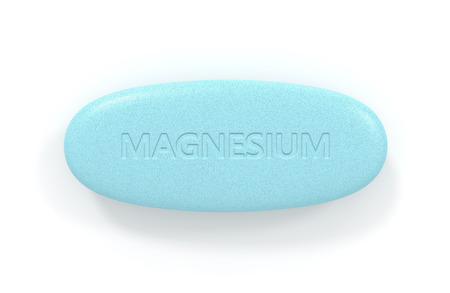 3d render of magnesium pill isolated over white background. Dietary supplements concept.の写真素材