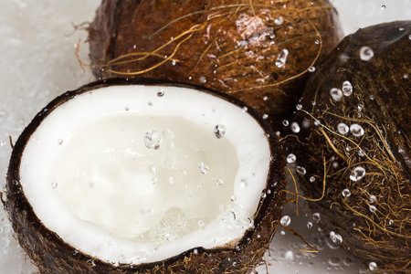Fresh coconuts and water splash