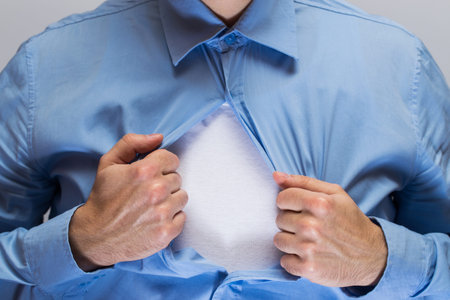 Man opening his blue shirt