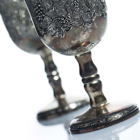 Old wine goblets on white backgroundの写真素材