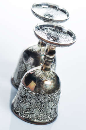 Old wine goblets on white backgroundの写真素材