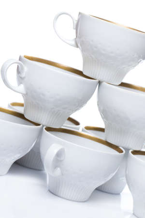 Ceramic coffee cups over white backgroundの写真素材