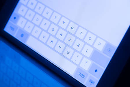 Tablet pc with keyboard interface on a screenの写真素材
